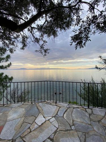 a view of the water from a balcony at Sunset of Pelion in Kato Gatzea