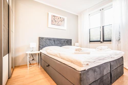 Ένα ή περισσότερα κρεβάτια σε δωμάτιο στο Wohnung Nr. 8 Haus Windrose