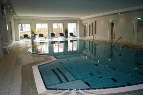 Πισίνα στο ή κοντά στο Residenz am Kurhaus Wohnung 30 4 Sterne DTV