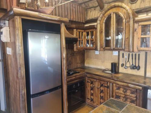 Køkken eller tekøkken på Bosveld Kuier Houthuis