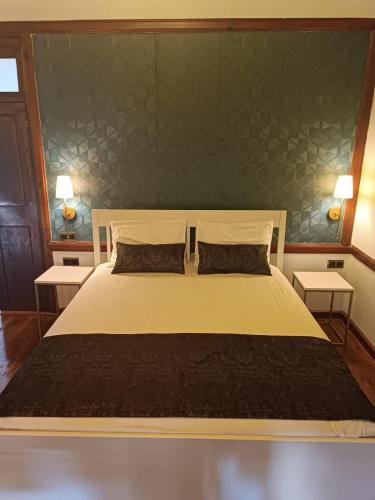 Ліжко або ліжка в номері Kalkan Port Hotel