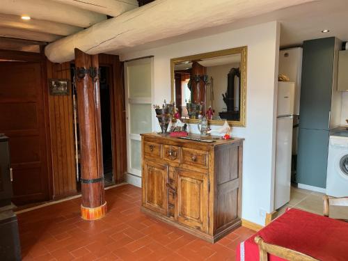 a bathroom with a sink and a mirror at Chalet Les Pierres Sauvages in Saint-Sorlin-dʼArves