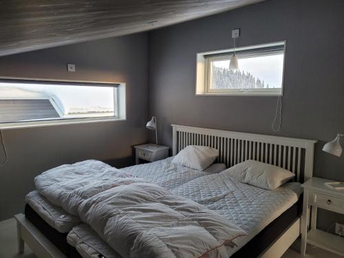 Postel nebo postele na pokoji v ubytování Tärnaby Ry Vy