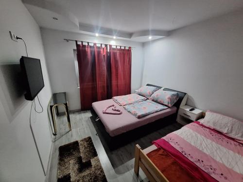 Katil atau katil-katil dalam bilik di Apartmani Lana