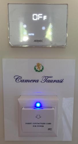 a white box with a blue light on it at Villa Nasti Luxury Bed Taurasi Room in Nocera Inferiore