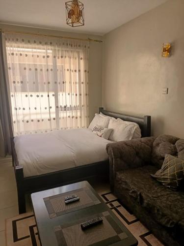 Bonsai Cozy Homes tesisinde bir odada yatak veya yataklar
