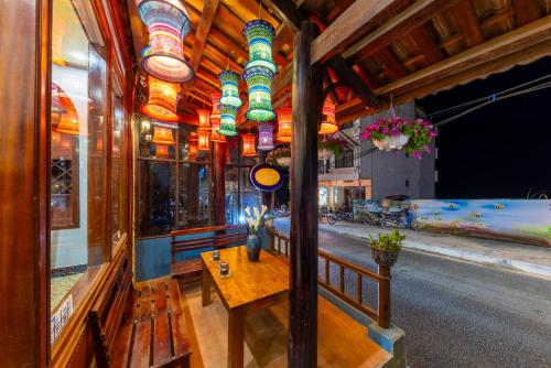 a room with a table and some lights and a street at Sapa View Spring Garden Hotel in Sa Pa