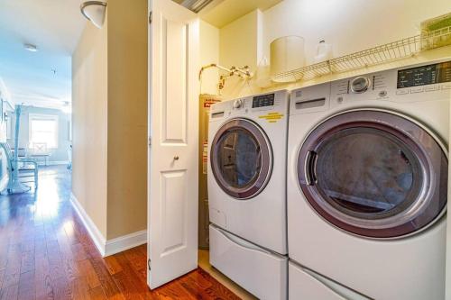 a white washer and dryer in a room at Central Ave Getaway with Elevator in Ocean City
