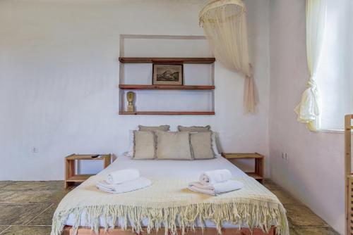 Postel nebo postele na pokoji v ubytování Villa Vrissi