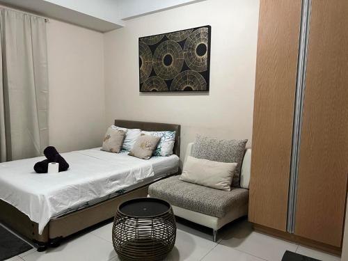 Postel nebo postele na pokoji v ubytování 101 NB Samspacious accomodation place