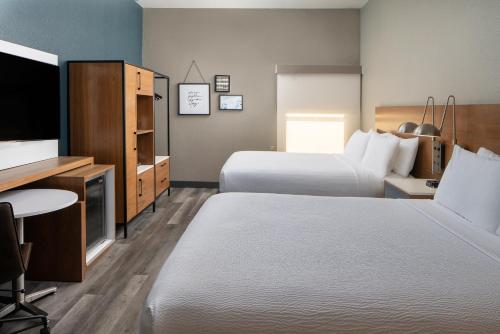 Ένα ή περισσότερα κρεβάτια σε δωμάτιο στο Four Points by Sheraton Alexandria