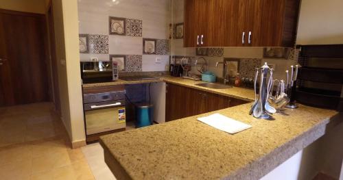 Kuchyň nebo kuchyňský kout v ubytování Utopia Villas - Ain Soukhna
