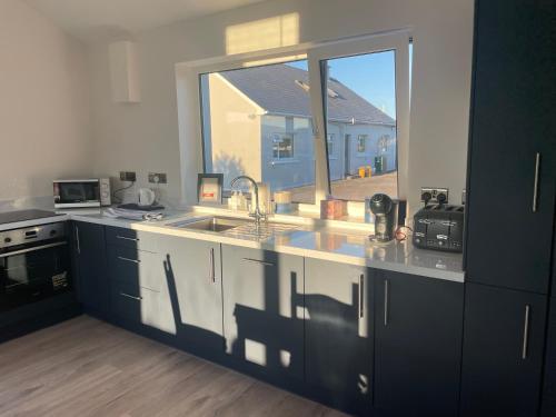 A kitchen or kitchenette at Stay Skelligs
