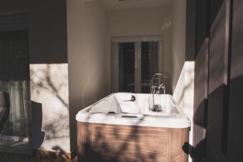 a bathroom with a sink and a mirror at Luxury B&B La Riserva Dannunziana in Pescara