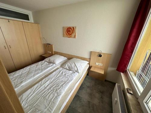 Ein Bett oder Betten in einem Zimmer der Unterkunft Hohegeiß_531
