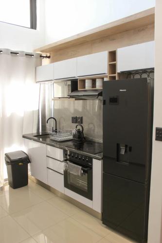 Η κουζίνα ή μικρή κουζίνα στο Deluxe Residence - Windhoek
