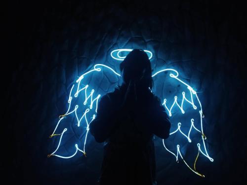 a person holding an umbrella with lightning bolts at Cabaña El Faro in Tubará