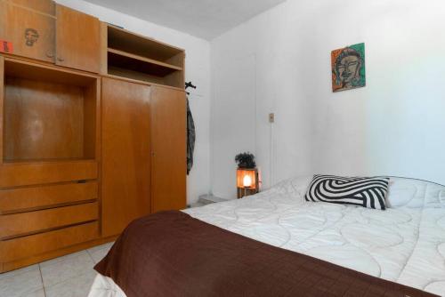 Ένα ή περισσότερα κρεβάτια σε δωμάτιο στο Casita playera y confortable