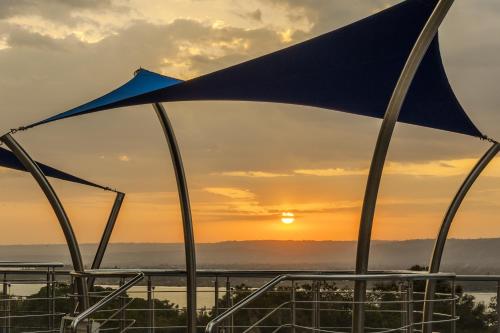 a view of the sunset from the top of a building at Acacia Premier Hotel in Kisumu
