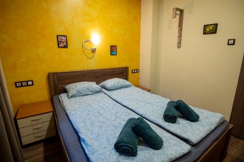 Кровать или кровати в номере Cozy 1BDR Apartment in Sofia Center