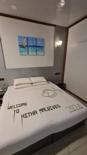 Postel nebo postele na pokoji v ubytování Hitha Maldives - Omadhoo
