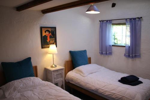 Ένα ή περισσότερα κρεβάτια σε δωμάτιο στο Aou Carde