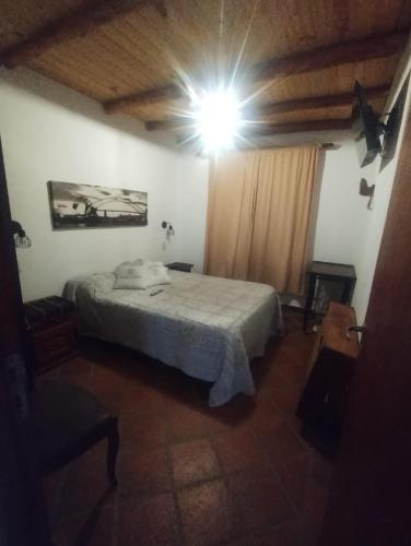 Postel nebo postele na pokoji v ubytování Departamento en la Villa