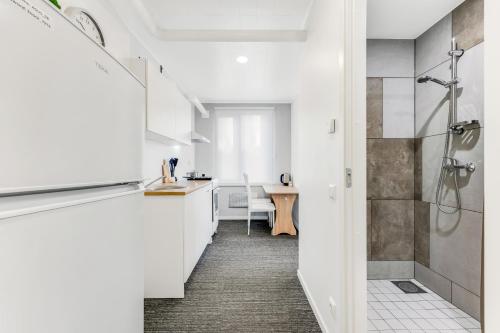 a bathroom with a shower and a sink at Juhkentali 46, korter 5 in Tallinn