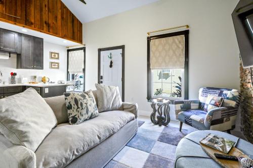 a living room with a couch and a table at New! Historic 1bed/1bath Suite Steps to River St! in Savannah