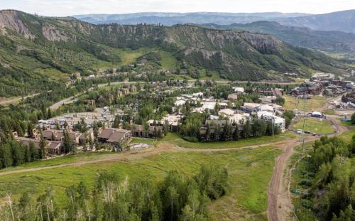 an aerial view of a village in the mountains at Timberline Condominiums 2 Bedroom Premier Unit C1D in Snowmass Village