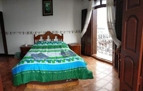 En eller flere senge i et værelse på HOTEL DANIELA 2