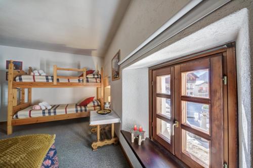 Postel nebo postele na pokoji v ubytování Maison Chasseur Alpine Design Lodge