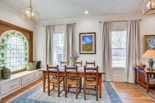 a dining room with a table and chairs and a window at Historic Charnwood Guest House- 1 Mile to Downtown in Tyler