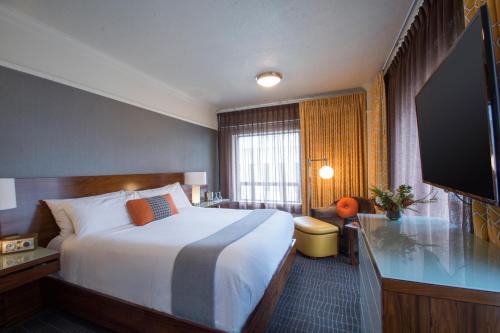 Postel nebo postele na pokoji v ubytování Hotel Lucia