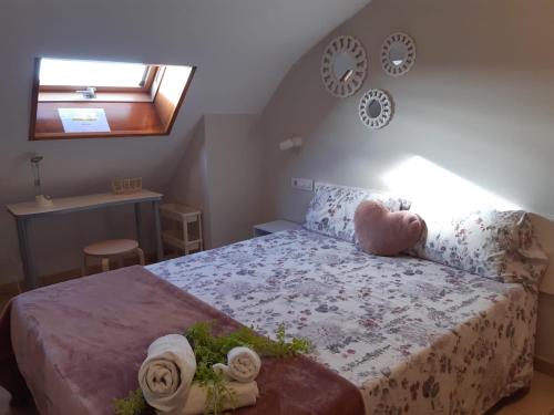 Кровать или кровати в номере Ático en Carril con vistas al mar