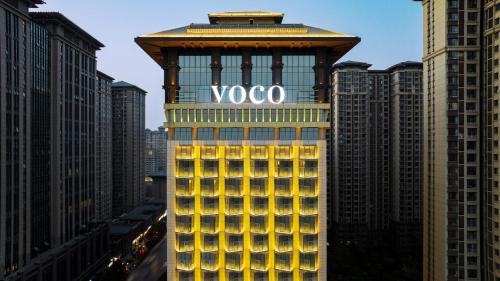 a voc sign on the top of a building at voco Xi'an Qindu Legend by IHG in Xi'an