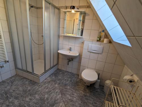Ett badrum på Haus Friesenglück Muschel