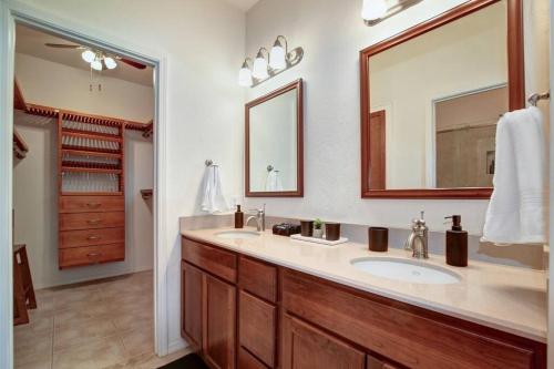a bathroom with a sink and a large mirror at Sedona Retreat W/ Tesla Mobile Charger in Sedona
