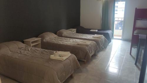 Ein Bett oder Betten in einem Zimmer der Unterkunft Vida, hotel de playa