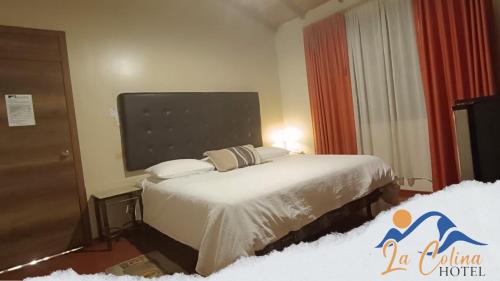 מיטה או מיטות בחדר ב-La Colina de Riobamba