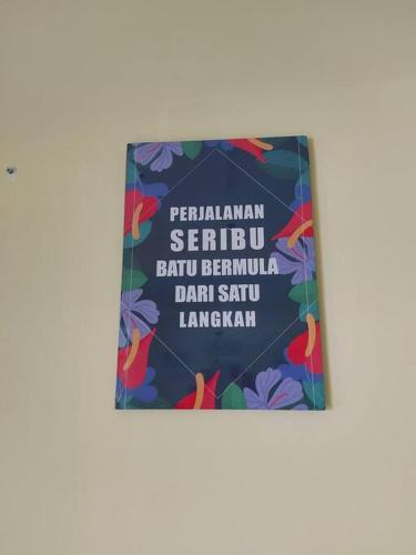 a sign for a party with flowers on it at Samma HomeStay Double Storey Terrace House in Kota Kinabalu