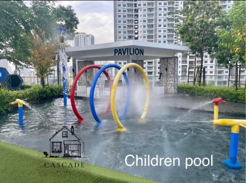 a water park with a water slide in the water at 22 Urban Suites #Georgetown #NEW #TopFacilities in Jelutong