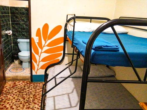 Hostal El Rioにあるベッド