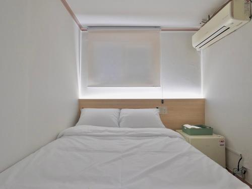 Postel nebo postele na pokoji v ubytování J5 Hostel