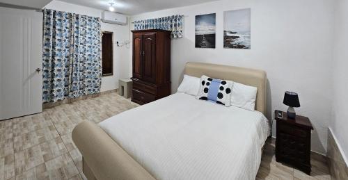 Postel nebo postele na pokoji v ubytování Rincón Marino