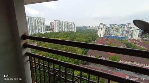 a balcony with a view of a city at Homestay Saujana Aster @ Putrajaya in Putrajaya