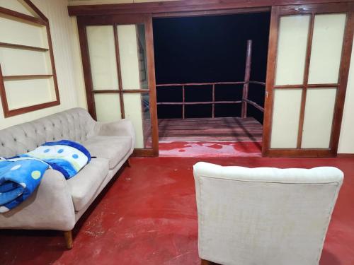 Ένα ή περισσότερα κρεβάτια σε δωμάτιο στο Casa campo WASI KINRAY