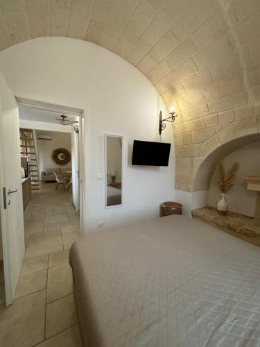 Ένα ή περισσότερα κρεβάτια σε δωμάτιο στο Il Casalino