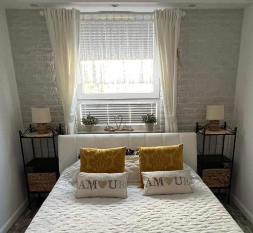מיטה או מיטות בחדר ב-Amko Style Apartamenty Rustica 31 Willa Nord