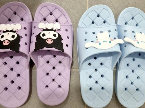 three pairs of hello kitty shoes with cow heads on them at Y202 & B201 near Hongdae Univ Station in Seoul